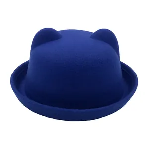 Close-up of royal blue felt hat featuring 3D cat ears and stylish rolled brim detail