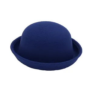 Close-up of a classic dark blue wool felt bowler hat with a curved brim for kids