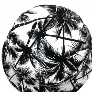 Retro fisherman hat featuring all-over black and white coconut tree print in canvas fabric