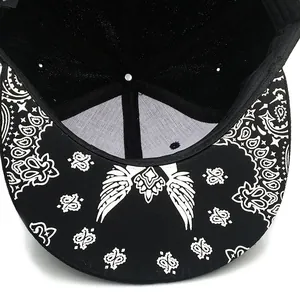 Hip hop snapback hat featuring 3D cross embroidery and paisley print under the brim