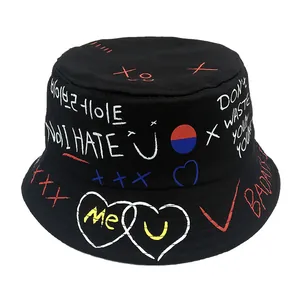 Black graffiti bucket hat with colorful street style art and heart patterns for sun protection