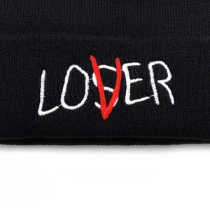 Black knit beanie featuring Loser Lover contrast embroidery for a stylish winter look