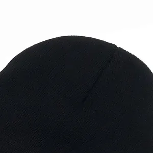 Classic black knitted winter beanie featuring premium stitch detail and soft thermal fabric