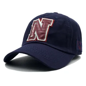 Navy blue baseball cap with burgundy N embroidery and New York side stitching for outdoor use