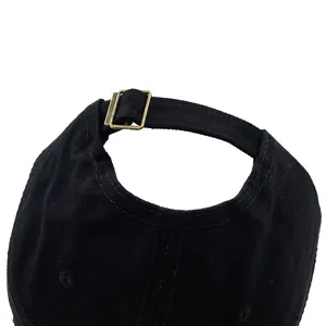 Rear view of black cotton baseball cap with adjustable bronze metal buckle and fabric strap