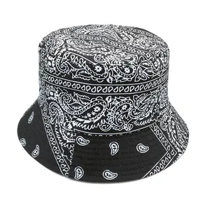 Reversible paisley fisherman bucket hat with black and white bandana pattern for sun protection