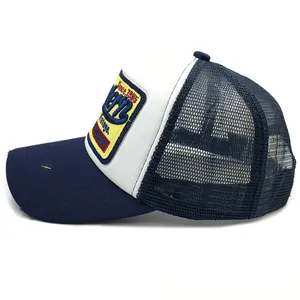 Vintage New York trucker hat with blue mesh and yellow Since 1985 embroidery
