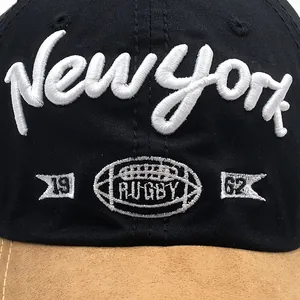Black cotton baseball cap with New York 1962 embroidery and brown suede brim detailing