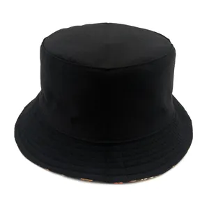Reversible black bucket hat with rose skull print and reinforced stitched brim sun hat