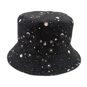 Reversible bucket hat with celestial sun moon and planet print in black and pink