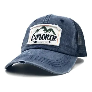 Distressed navy blue Explorer mountain embroidery baseball trucker hat with mesh back