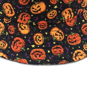 Halloween bucket hat with orange pumpkins and purple bats print on black cotton fabric