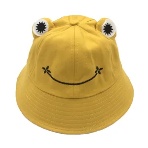 Cute yellow frog bucket hat for kids and adults with funny eyes and smiling face