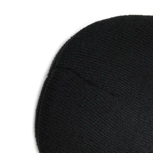 Close-up of black ribbed knit beanie featuring detailed embroidery of a cute cartoon frog