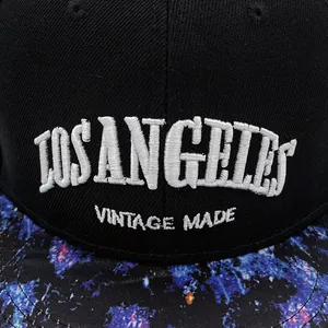 Black Los Angeles embroidered flat brim baseball cap with a colorful galaxy print visor