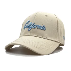 Beige cotton baseball cap with light blue California embroidery and curved brim