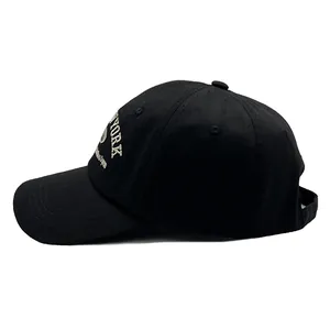 Classic black cotton baseball cap with New York embroidery in a 45-degree side view