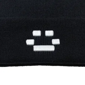 Quackity black knit beanie with pixel embroidery details for winter warmth