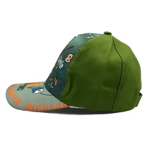 Kids dinosaur baseball cap in olive green with Little Monster print and curved brim