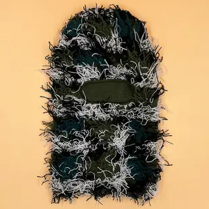 Green camouflage knit balaclava mask with fuzzy texture for winter warmth and skiing