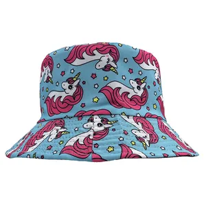 Close-up of sky blue bucket hat featuring cartoon unicorn and star print patterns