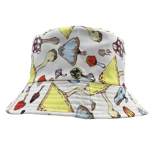 Close-up of colorful mushroom print texture on a white canvas bucket sun hat