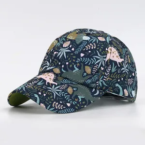 Casquette enfant bleu marine avec imprimé dinosaure et visière contrastée