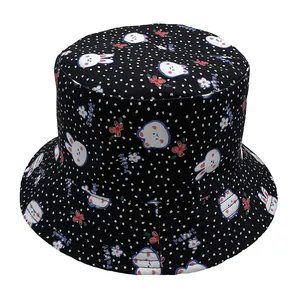 Detail of black bucket hat with white polka dots, cute rabbit patterns, and sweet text