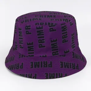 Detail of purple bucket hat featuring black PRIME letter print and reinforced stitching