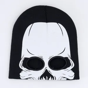 Black knitted beanie with white alien skull pattern and eye holes for Halloween costume