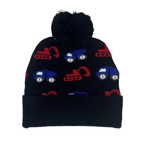 Kids black knit beanie with excavator patterns and a fuzzy pom-pom for winter warmth