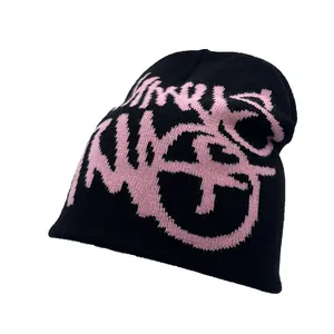 Black knitted beanie with pink graffiti pattern and street style jacquard design
