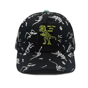 Kids dinosaur baseball cap featuring white bone print and green T-Rex embroidery
