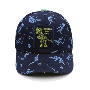 Kids dinosaur bone print baseball cap with T-Rex patch and Make Some Noise text