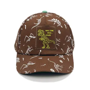 Brown dinosaur bone print kids baseball cap with neon green T-Rex embroidery