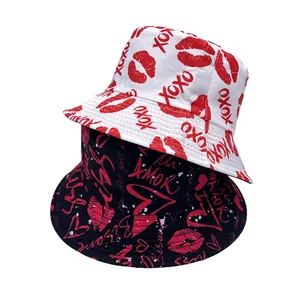Summer bucket hats with red heart and lip prints in black and white canvas