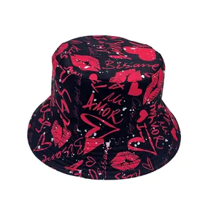 Detail of bucket hat featuring romantic graffiti prints with heart and lip patterns