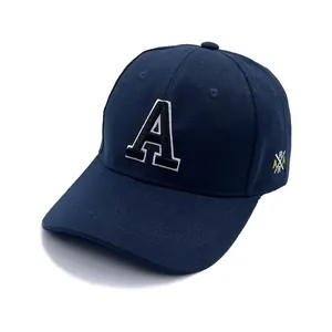 Detail of high-quality navy blue baseball cap featuring 3D letter A and side logo embroidery