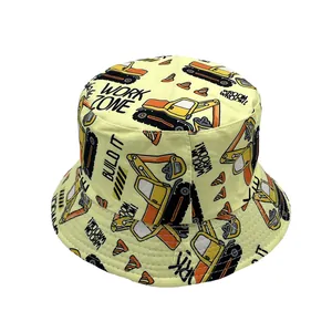 Detail of yellow cotton sun hat with cartoon excavators and work zone prints