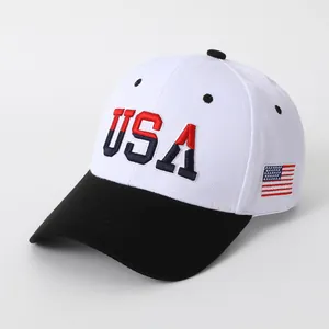 Detail of embroidered USA letters and American flag patch on classic baseball cap