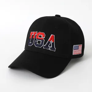 Black cotton baseball cap featuring large USA embroidery and American flag side patch