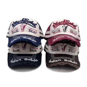 Detail showing vintage mesh baseball caps with bull embroidery and distressed brims
