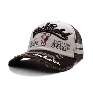 Distressed mesh trucker hat with BlackRebel skull embroidery in brown and beige