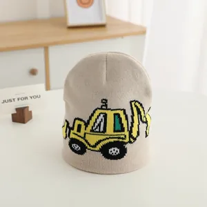 Beige kids knitted beanie with yellow excavator jacquard pattern for boys winter