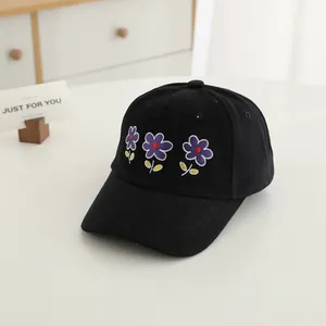Kids' black cotton baseball cap featuring cute purple floral embroidery on front