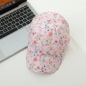 Pink floral print baseball cap for girls with curved brim and vintage flower pattern