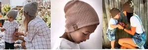 Detail of ribbed knit texture and leather patch on toddler winter hats in grey and pink