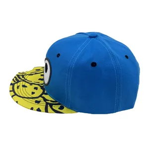 Blue and yellow snapback hat with cartoon eye embroidery and graffiti patterned brim