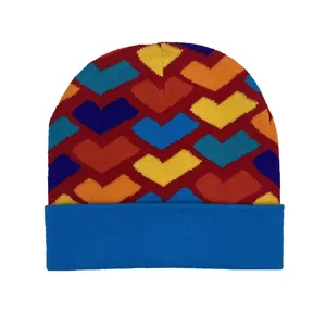 Colorful heart jacquard knitted beanie for women with blue fold-over cuff for winter warmth