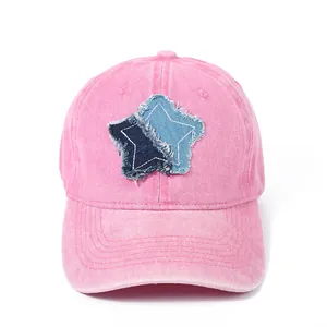 Pink washed cotton baseball cap with vintage denim star patches and distressed details